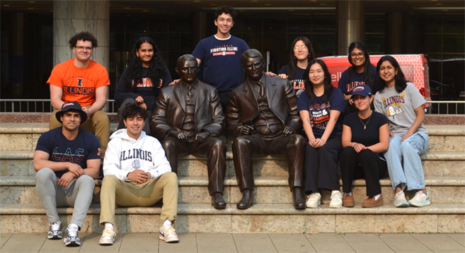 Group of SURF sit on steps with Mayo brothers