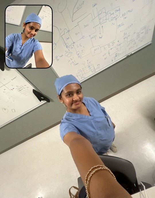 2025 SURF Ramesh selfie of herself in scrubs