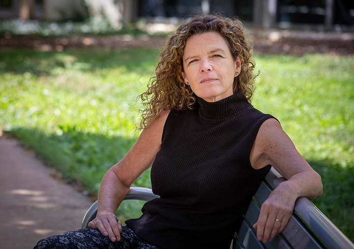 Colleen Bushell, former senior research scientist at the University of Illinois&amp;rsquo; Applied Research Institute (ARI), sitting on a park bench