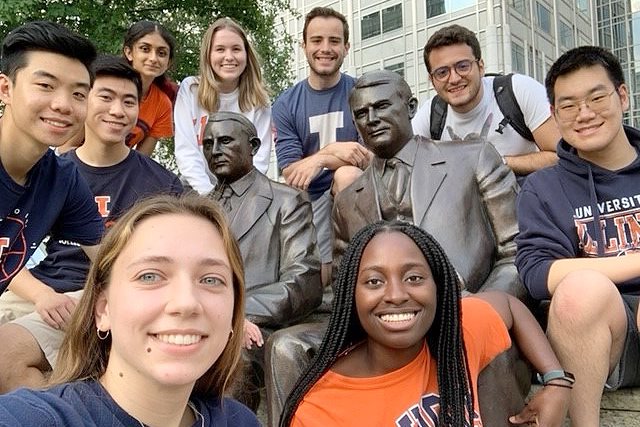 group of Illinois SURF students around Mayo brothers statue at Mayo Clinic in Rochester, MN